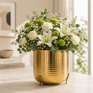 Hammered Gold Metal Planter with Leaf-Shaped Legs